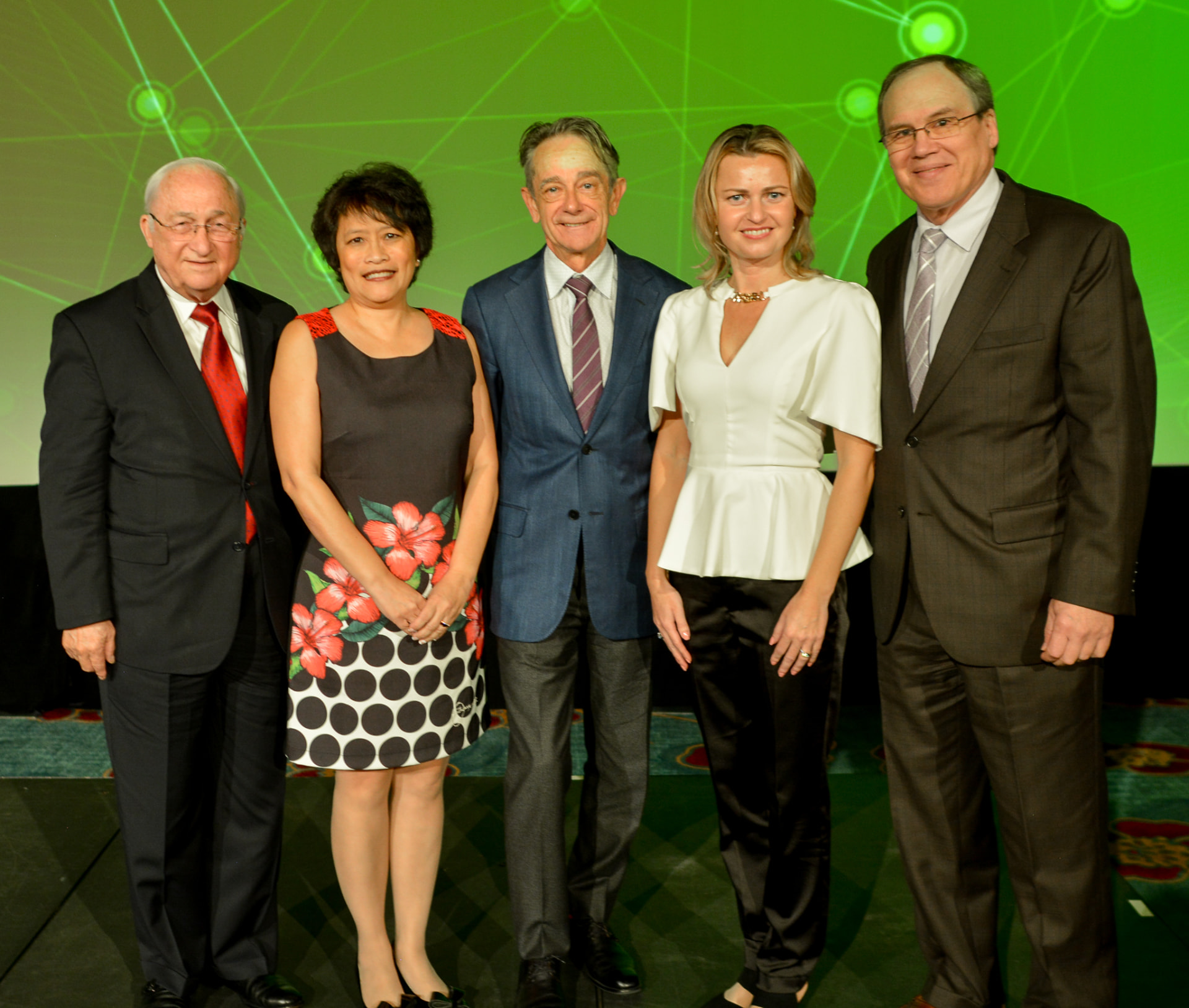 On stage with fellow practitioners and conference chairs